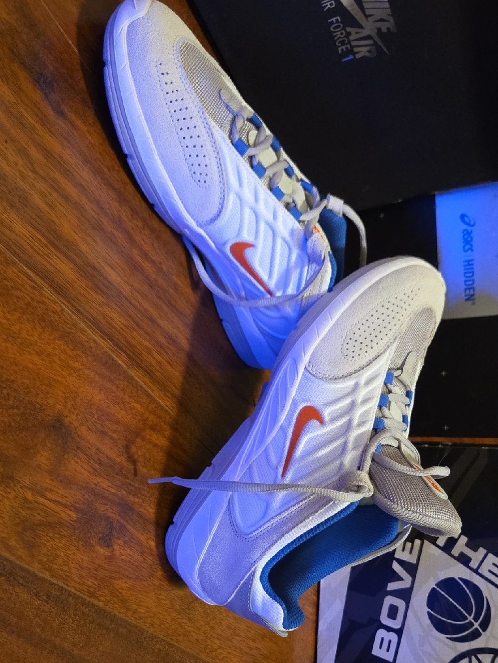Nike Men’s White Sneakers with Orange Swoosh and Blue Lining